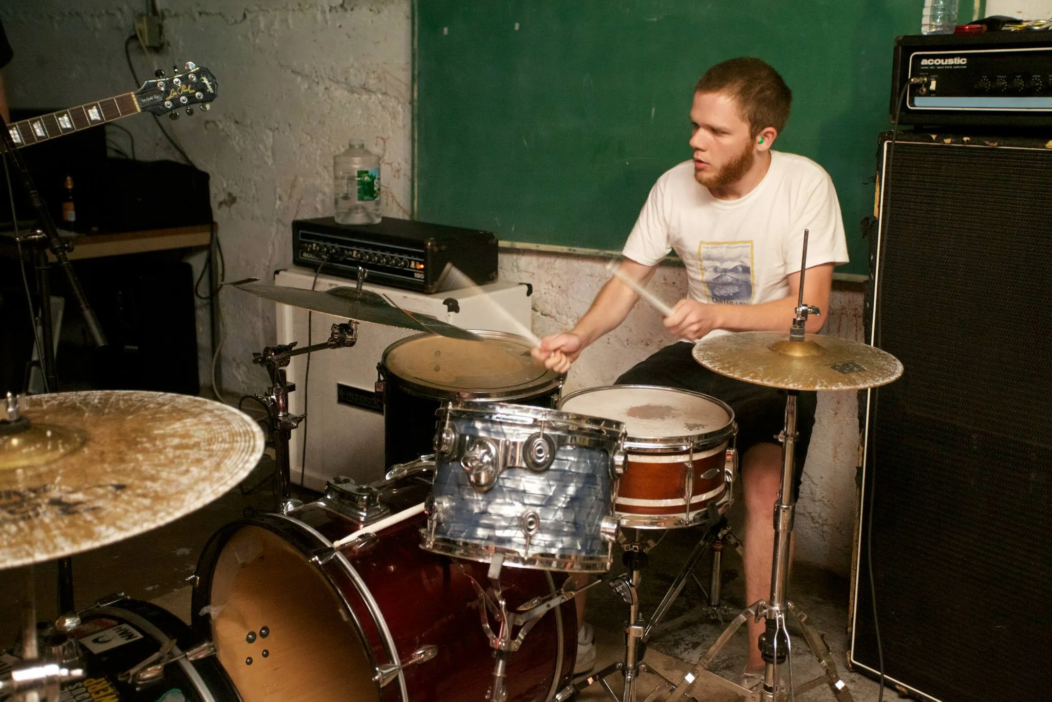 Brendan Smyth playing drums at a gig.